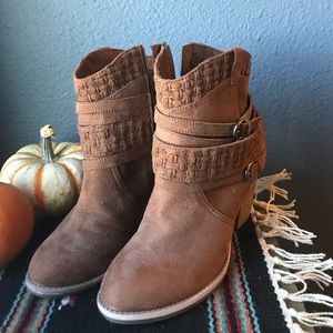 Brown cowgirl booties from Altar’d State.